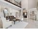 Open concept living area with a wet bar and high ceilings at 2490 Zuni Rd, St Cloud, FL 34771