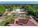 Clay tile roof of a luxury home with a large backyard at 2490 Zuni Rd, St Cloud, FL 34771