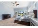 Serene Primary bedroom with king bed and backyard access at 2490 Zuni Rd, St Cloud, FL 34771