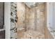 Spa-like shower with multiple shower heads and built-in bench at 2490 Zuni Rd, St Cloud, FL 34771