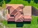 Top-down view of a home with a distinctive terracotta tile roof at 2490 Zuni Rd, St Cloud, FL 34771