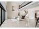 Spacious living room with high ceilings and large windows at 2490 Zuni Rd, St Cloud, FL 34771