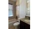 Clean bathroom with tub, toilet and granite vanity at 2211 Rickover Pl, Winter Garden, FL 34787