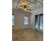 Bright bedroom with ceiling fan and French doors at 2211 Rickover Pl, Winter Garden, FL 34787