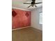 Spacious bedroom with ceiling fan and large window at 2211 Rickover Pl, Winter Garden, FL 34787