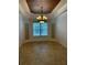 Formal dining room with chandelier and tile flooring at 2211 Rickover Pl, Winter Garden, FL 34787