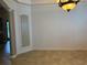 Bright dining room with tile floors and decorative wall niche at 2211 Rickover Pl, Winter Garden, FL 34787