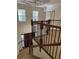 Two-story entryway with a curved staircase and decorative ceiling at 2211 Rickover Pl, Winter Garden, FL 34787