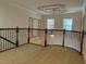 Two-story entryway with a curved staircase and decorative ceiling at 2211 Rickover Pl, Winter Garden, FL 34787