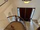 View from upper landing showcasing the grand entryway below at 2211 Rickover Pl, Winter Garden, FL 34787
