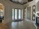 Bright and spacious entryway with double doors leading to the pool at 2211 Rickover Pl, Winter Garden, FL 34787