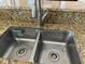 Modern double sink with a brushed nickel faucet at 2211 Rickover Pl, Winter Garden, FL 34787