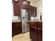 Stainless steel refrigerator in a spacious kitchen at 2211 Rickover Pl, Winter Garden, FL 34787