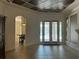 Bright living room with tile floors, access to pool and view of the backyard at 2211 Rickover Pl, Winter Garden, FL 34787