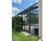 Screened-in pool enclosure with access gate at 2211 Rickover Pl, Winter Garden, FL 34787