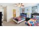 Twin-size beds with Marvel bedding, access to bathroom at 1431 Wexford Way, Davenport, FL 33896