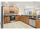 Spacious kitchen featuring stainless steel appliances and ample cabinetry at 1431 Wexford Way, Davenport, FL 33896
