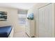 Bright bedroom with a twin bed, dresser, and large window with window blinds at 1431 Wexford Way, Davenport, FL 33896