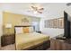 Bright bedroom with a king-size bed and plenty of natural light at 1431 Wexford Way, Davenport, FL 33896