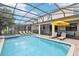 Large, screened pool and spa with plenty of room for lounging at 1431 Wexford Way, Davenport, FL 33896