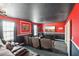 Home theater room with seating for multiple people and large screen TV at 1431 Wexford Way, Davenport, FL 33896