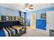 Bunk beds, beanbag chair, and access to a bathroom at 1431 Wexford Way, Davenport, FL 33896