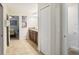 Clean bathroom with double vanity, granite countertop, and tile flooring at 1431 Wexford Way, Davenport, FL 33896
