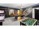 Game room featuring pool table, foosball, and arcade games at 1431 Wexford Way, Davenport, FL 33896