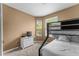 Bedroom with full-over-full bunk bed and dresser at 8101 Coconut Palm Way # 203, Kissimmee, FL 34747