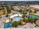 Aerial view of community pool and tennis courts at 8101 Coconut Palm Way # 203, Kissimmee, FL 34747