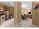 Open kitchen and dining area with modern appliances at 8101 Coconut Palm Way # 203, Kissimmee, FL 34747