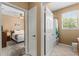 Bathroom with tub shower combination and access to bedrooms at 8101 Coconut Palm Way # 203, Kissimmee, FL 34747