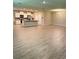 Open floor plan combining kitchen, living and dining areas at 17926 Hither Hills Cir, Winter Garden, FL 34787