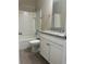 Bathroom with granite countertop and tub at 17926 Hither Hills Cir, Winter Garden, FL 34787