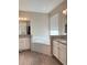Large bathroom with corner tub and double vanity at 17926 Hither Hills Cir, Winter Garden, FL 34787