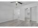 Bedroom with mirrored closet and access to bathroom at 702 S Myrtle Ave, New Smyrna Beach, FL 32168