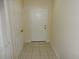Entryway with tile flooring and coat closet at 6214 Stevenson Dr # 201, Orlando, FL 32835
