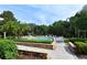 Relaxing community pool area with lush landscaping at 6214 Stevenson Dr # 201, Orlando, FL 32835