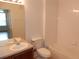 Clean bathroom with tub, toilet and vanity at 6214 Stevenson Dr # 201, Orlando, FL 32835