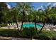 Inviting community pool with plenty of lounge chairs at 6214 Stevenson Dr # 201, Orlando, FL 32835