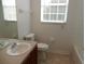 Bathroom with tub, toilet and vanity at 6214 Stevenson Dr # 201, Orlando, FL 32835