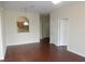 Bright living room with hardwood floors and access to kitchen at 6214 Stevenson Dr # 201, Orlando, FL 32835