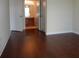 Bedroom with hardwood floors and en-suite bathroom at 6214 Stevenson Dr # 201, Orlando, FL 32835