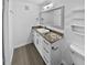 Updated bathroom with granite countertop and modern vanity at 4350 Perkinshire Ln # 111, Orlando, FL 32822
