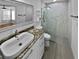 Updated bathroom with granite vanity and glass shower at 4350 Perkinshire Ln # 111, Orlando, FL 32822