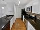 Modern kitchen boasting stainless steel appliances and granite countertops at 4350 Perkinshire Ln # 111, Orlando, FL 32822
