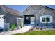 Front view of house with stone accents and landscaping at 17694 Sw 61St Lane Rd, Dunnellon, FL 34432