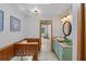 Charming bathroom with a unique sink and wooden details at 7451 Sadler Rd, Mount Dora, FL 32757