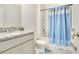 Clean bathroom with tub shower combination at 1157 Torrente Ln, Haines City, FL 33844