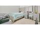 Bright bedroom with a comfortable bed and vanity at 1157 Torrente Ln, Haines City, FL 33844